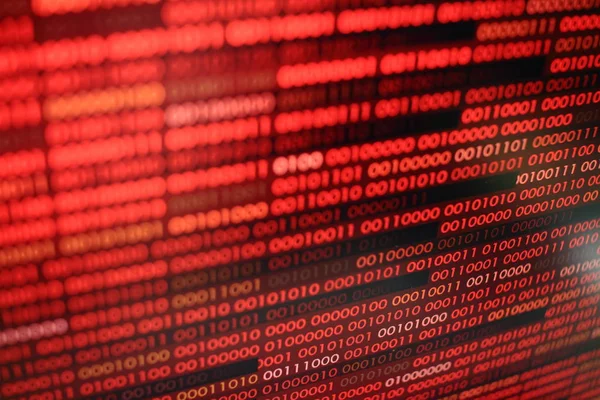 red binary code. computer technology background. red binary code computer language data transfers. unsecured and dangerous big data and ai artificial intelligence cyber network.