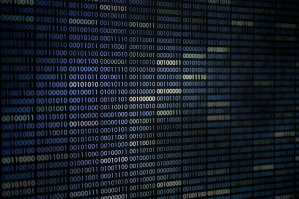 information war. red binary code blocks flowing downward. danger, war,  conflict, hacker, error and virus concepts. dark red background and  computer language for cyber warfare. Stock Photo