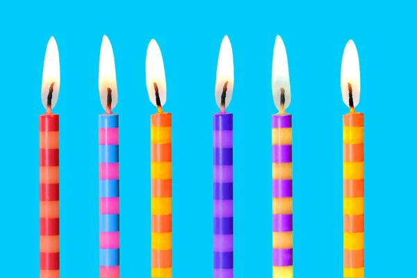 Burning Colored Birthday Candles Blue Background — Stock Photo, Image