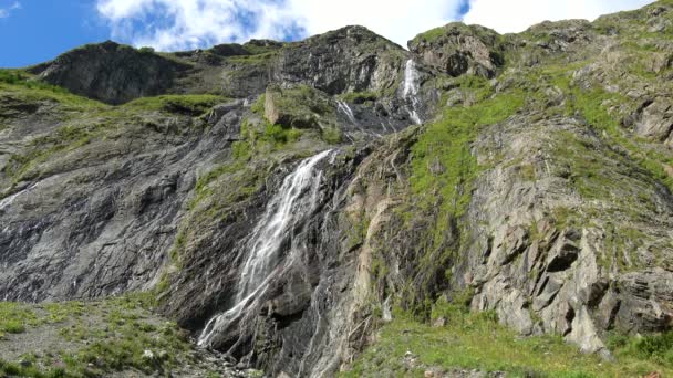 Scenic view of mountain waterfall in national park Dombai, Caucasus, Karachay-Cherkess Republic, Russia — Stock Footage Scenic View Mountain Waterfall National Park Dombai Caucasus Karachay Cherkess Royalty Free Stock Footage