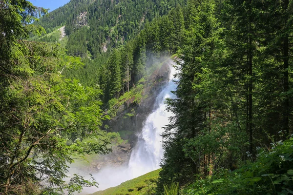 View Alpine inspiring Krimml waterfall in mountains in summer day. Trekking in National park Hohe Tauern, Austria