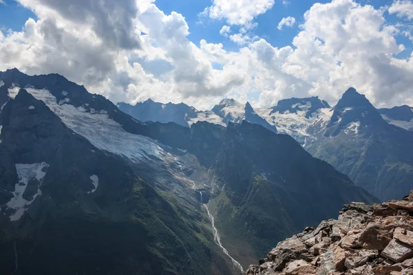 Panorama of mountains scene with dramatic blue sky in national park