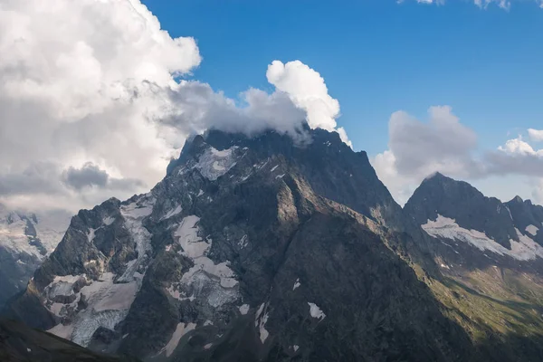 Panorama of mountains scene with dramatic blue sky in national p