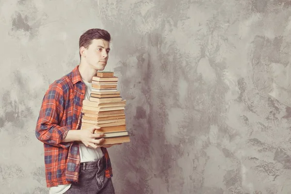 Young boy student hold many books. Guy want learning, have educa — Stock Photo, Image