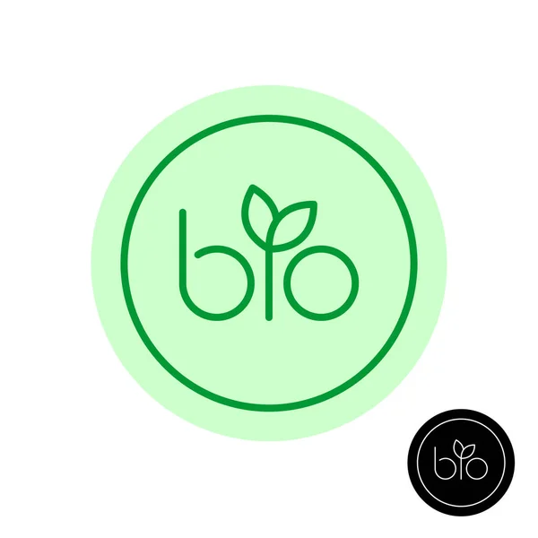 Bio-Textsymbol mit grünen Blättern auf Buchstaben i. Naturprodukt. — Stockvektor