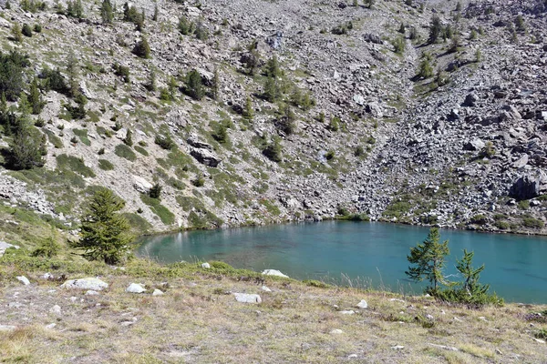 Lake Muff, a small and colorful alpine lake, above Champorcher