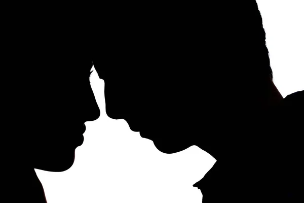 Silhouette iki kişi adam ve kız — Stok fotoğraf