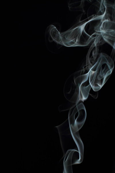 White smoke texture on black background