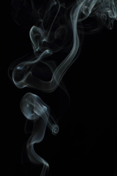 White smoke texture on black background