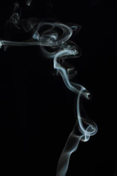 Weißer Rauch Auf Schwarzem Hintergrund lizenzfreie Stockfotos