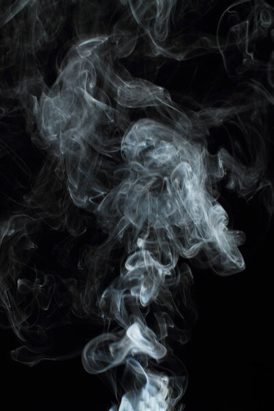 White smoke texture on black background