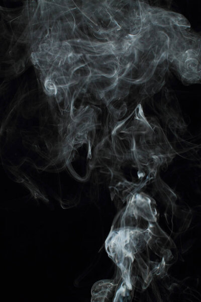 White smoke texture on black background