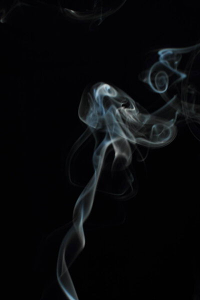 White smoke texture on black background
