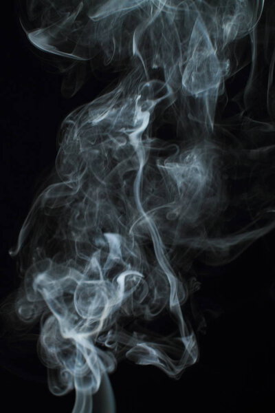 White smoke texture on black background