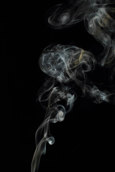 White smoke texture on black background