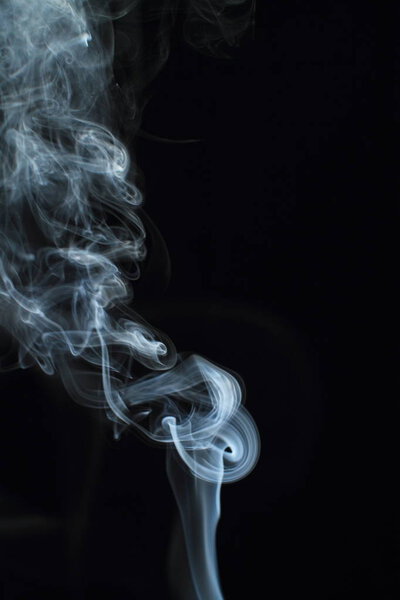 White smoke texture on black background