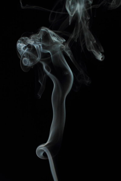 White smoke texture on black background