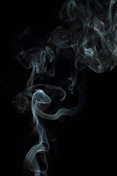 White smoke texture on black background
