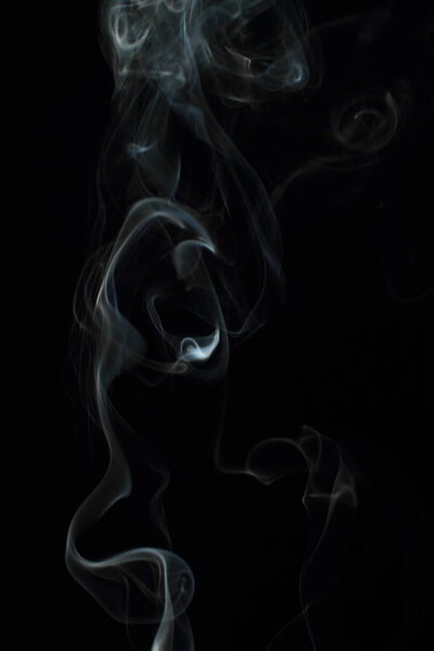 White smoke texture on black background