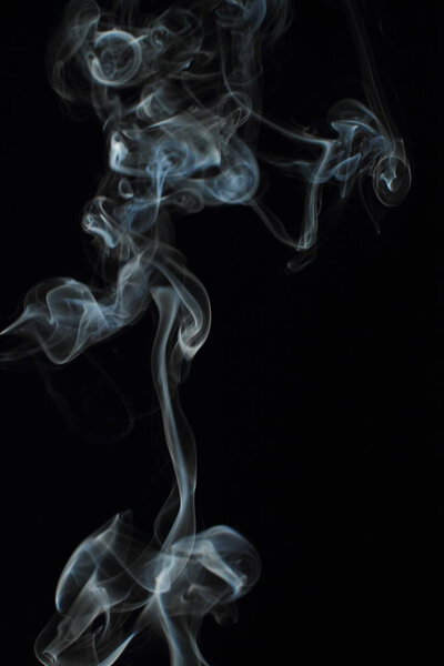 White smoke texture on black background