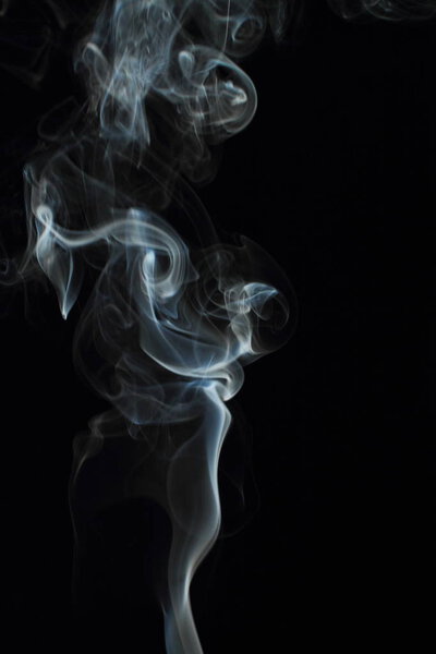 White smoke texture on black background