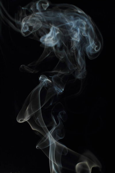 White smoke texture on black background