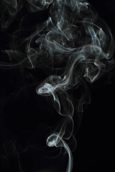 White smoke texture on black background