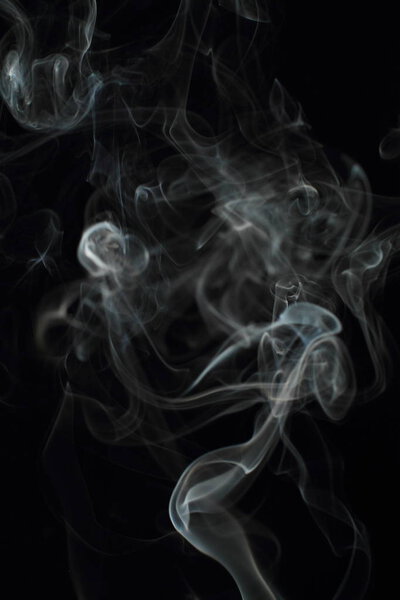 White smoke texture on black background
