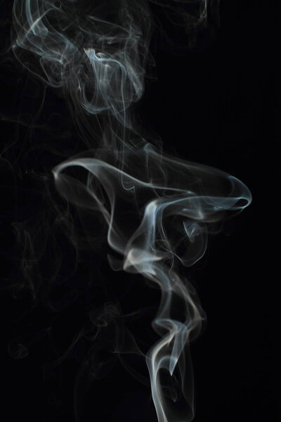 White smoke texture on black background