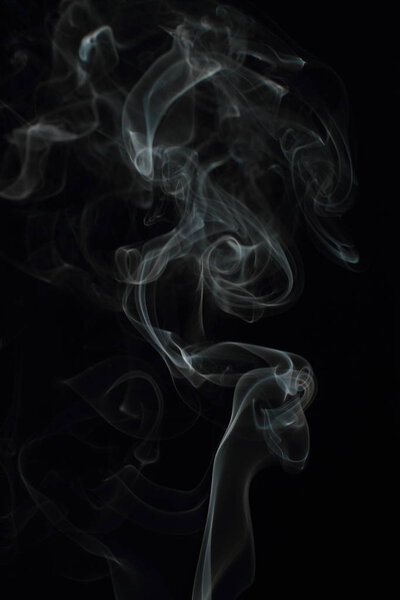 White smoke texture on black background