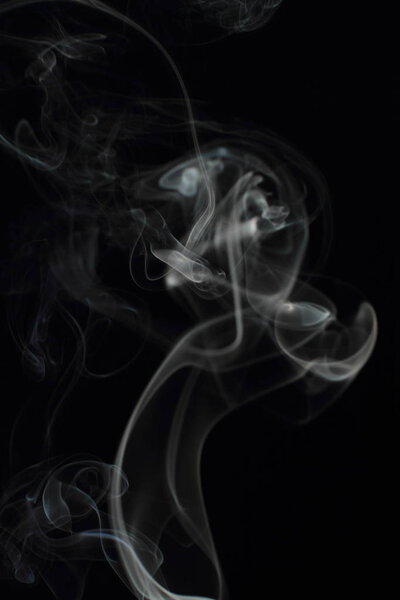 White smoke texture on black background
