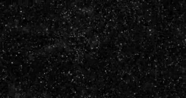 Siyah bir zemin üzerine kar yağışı