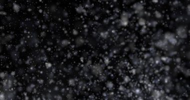 Siyah bir zemin üzerine kar yağışı