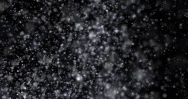 Siyah bir zemin üzerine kar yağışı