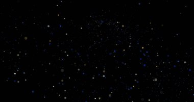 Siyah arkaplanda uçan toz parçacıkları