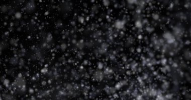 Siyah bir zemin üzerine kar yağışı