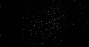 Siyah arkaplanda soyut toz parçacıkları uçuyor
