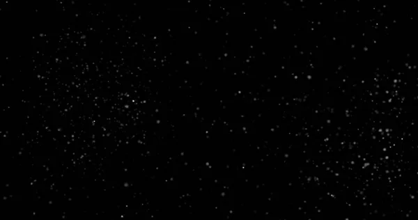 Siyah arkaplanda soyut toz parçacıkları uçuyor