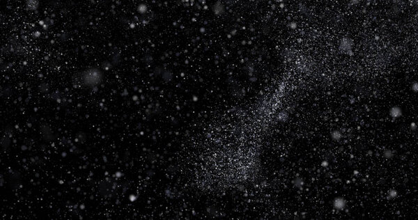 Летающие абстрактные частицы пыли на черном фоне
