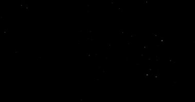 Siyah arkaplanda soyut toz parçacıkları uçuyor