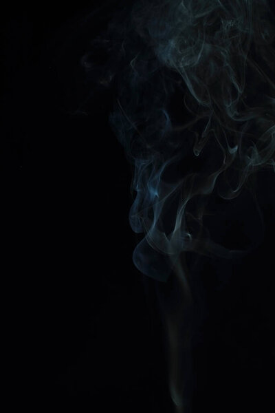 White smoke on a black background