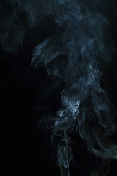 White smoke on a black background