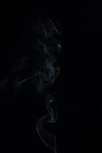 White smoke on a black background