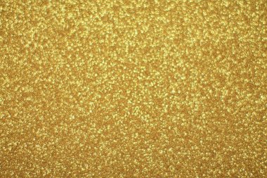 Parlak soyut parıltı dokusu dinamik tasarımı olan altın arkaplan