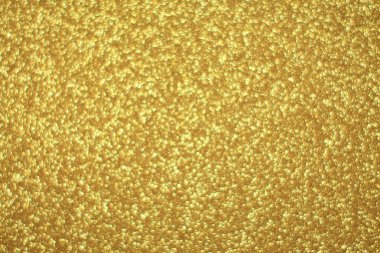 Parlak soyut parıltı dokusu dinamik tasarımı olan altın arkaplan