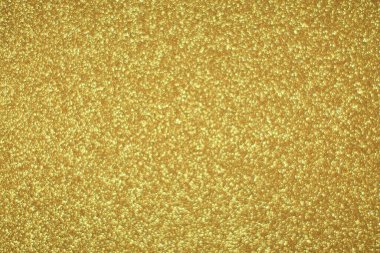 Parlak soyut parıltı dokusu dinamik tasarımı olan altın arkaplan