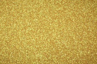 Parlak soyut parıltı dokusu dinamik tasarımı olan altın arkaplan