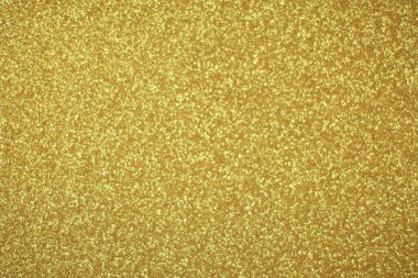Parlak soyut parıltı dokusu dinamik tasarımı olan altın arkaplan