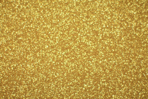 Bright abstract glitter texture gold background with dynamic design