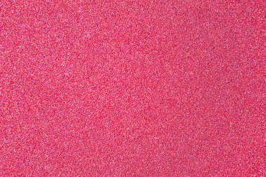 Parlak soyut parıltı dokusu dinamik tasarımı olan pembe arkaplan